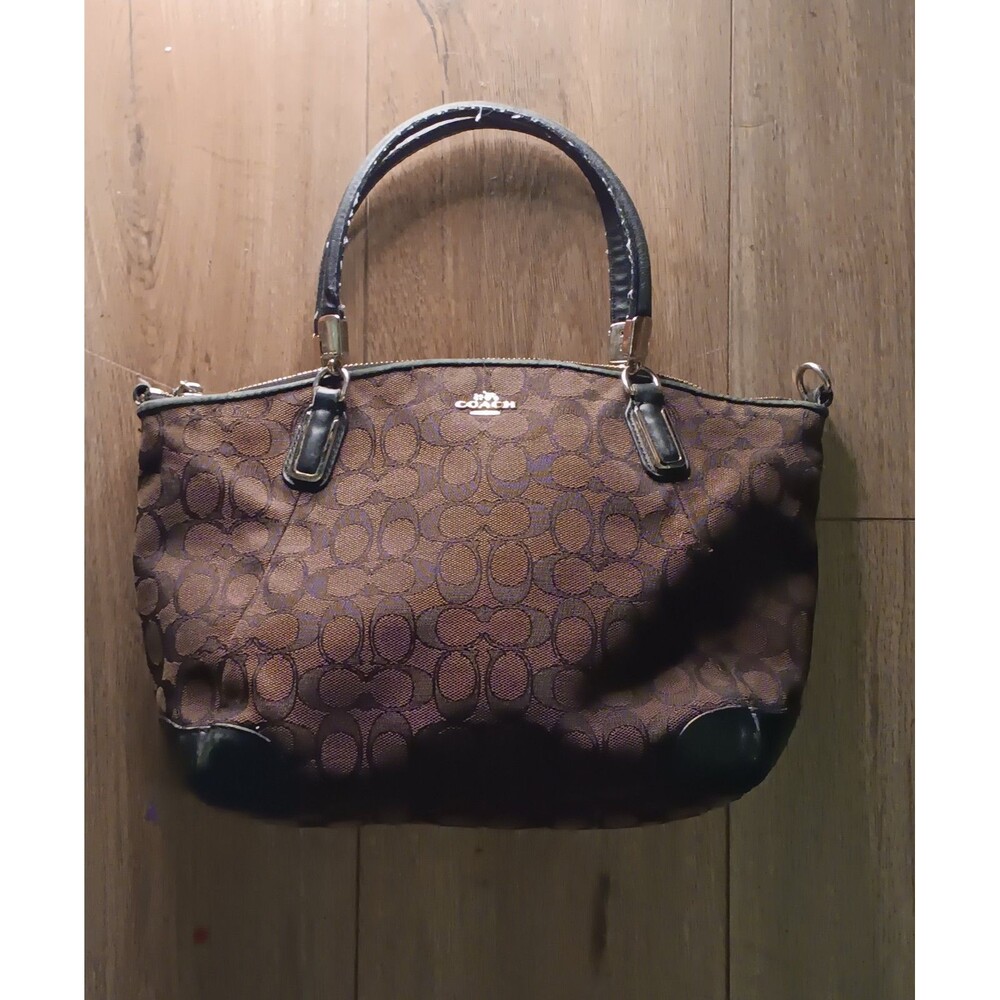 Womans small Brown Coach purse